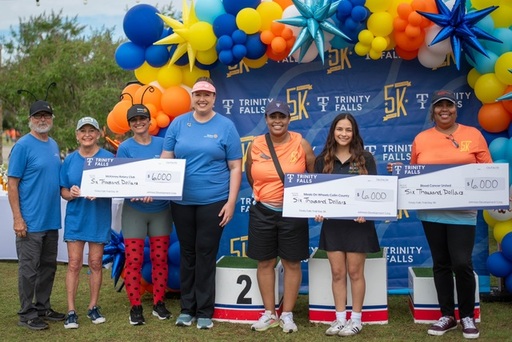 2026 Trinity Falls 5K check presentation Group.JPE